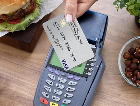 Credit Card being used at payment terminal